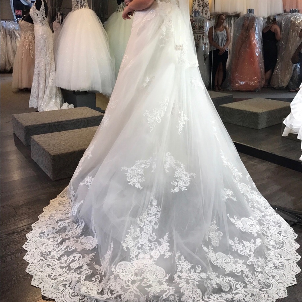 Allure Bridal style: C385
White lace A-line dress - Picture 7 of 8